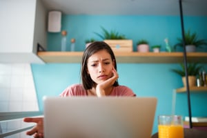 Confused women at desk